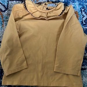 Elfie London golden yellow Peter Pan collar shirt.